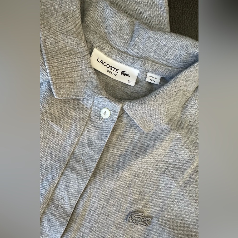 Woman’s Lacoste sz 6 gray polo